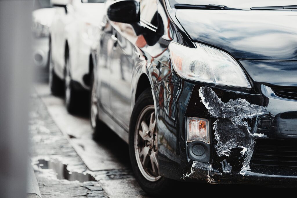 Broken Scratched And Dent Bumper Fender Car after Collision
